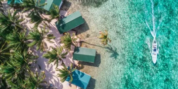 An aerial view down at bargain properties along the beach. Buying cheap real estate overseas