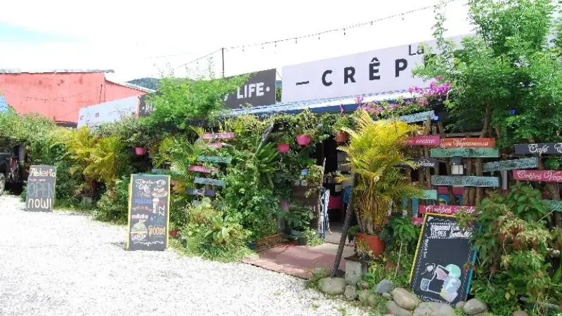 Colorful café with lush greenery in Boquete