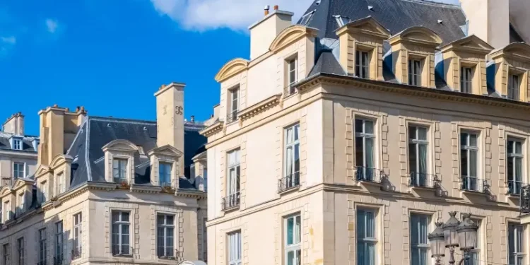 Paris, beautiful buildings place des Victoires, typical parisian facades and windows