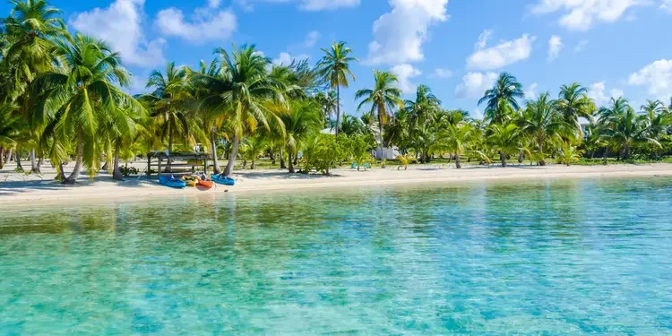 Belize Cayes - Small tropical island at Barrier Reef with paradise beach - known for diving, snorkeling and relaxing vacations - Caribbean Sea, Belize, Central America