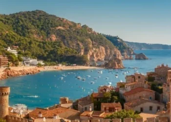 Aerial view of Fortress Vila Vella and Badia de Tossa bay at summer in Tossa de Mar on Costa Brava, Catalunya, Spain. low humidity overseas