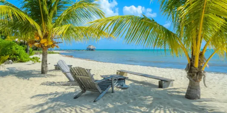 Paradise beach in Placencia, tropical coast of Belize, Caribbean Sea, Central America.