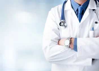 Doctor Man With Stethoscope In Hospital