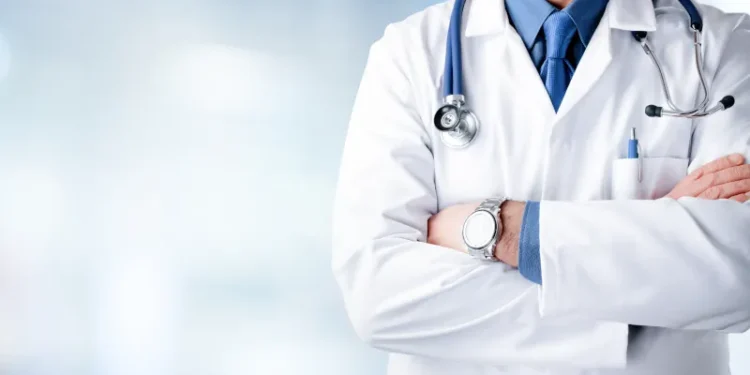Doctor Man With Stethoscope In Hospital