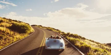 Couple in convertible speeding.