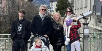 Lief Simon and Kathleen Peddicord pose with their family during a winter trip to Chamonix in 2025.