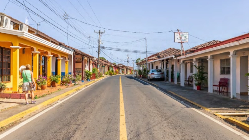 an empty street on the small town of pedasi, panama