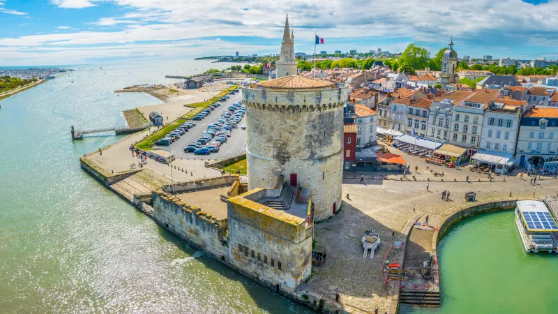 Seaside of La Rochelle dominated by Tour de la Lanterne and tour de la chaine, France