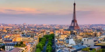 Skyline of Paris with Eiffel Tower in Paris, France. Panoramic sunset view of Paris