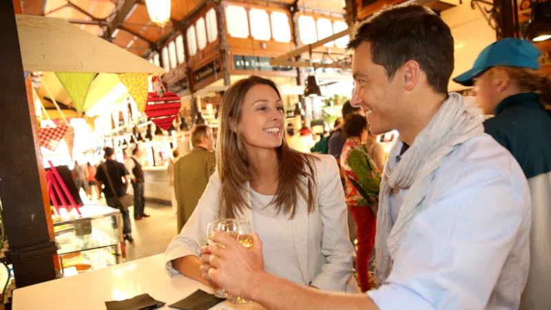Couple in Madrid eating spanish savouries