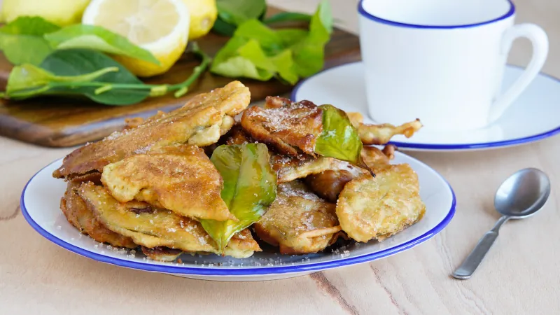 Paparajotes - typical dessert of Murcia, made of lemon leaves covered with dough, sprinkled with powdered sugar and cinnamon