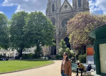 Kathleen Peddicord in Paris with Notre-Dame in the background