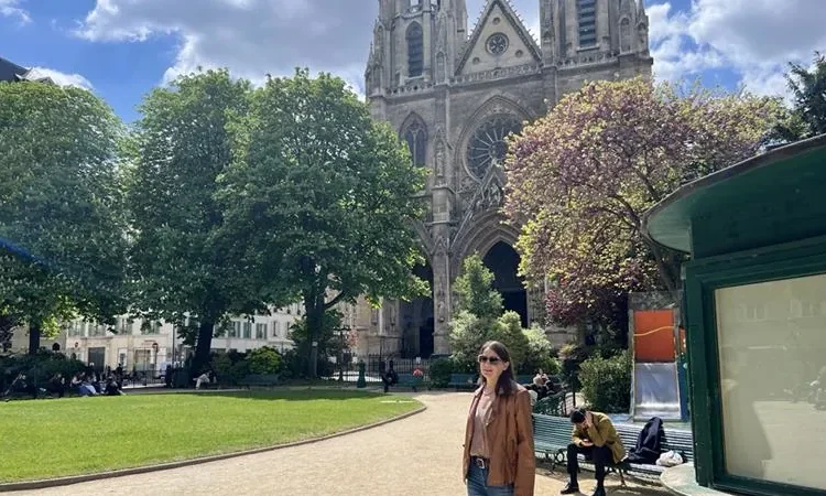 Kathleen Peddicord in Paris with Notre-Dame in the background