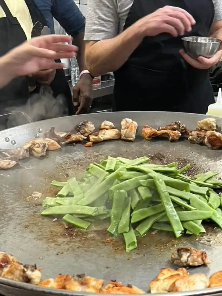 Meat cooked, beans on the flame