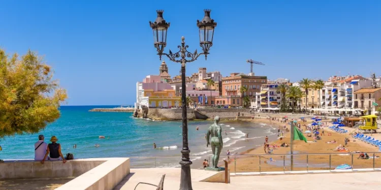 Sitges, Catalunya, Spain, Sculpture of a naked woman on the waterfront.
