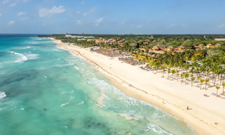 Playa del Carmen white sand beach and luxury hotels seen from above – Mexico expat lifestyle