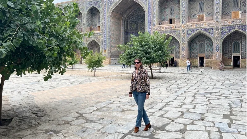 Kathleen Peddicord walking around the Registan in Samarkand, Travelling to Uzbekistan