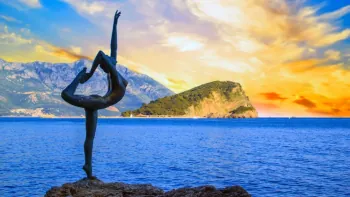 Beautiful view of the sculpture Ballerina Dancer of Budva at sunset, Budva, Montenegro