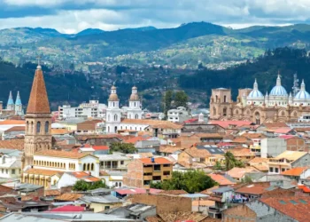 View of the city of Cuenca, Ecuador, with it's many churches and rooftops, on a cloudy day