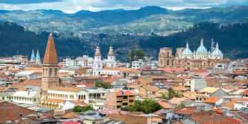 View of the city of Cuenca, Ecuador, with it's many churches and rooftops, on a cloudy day