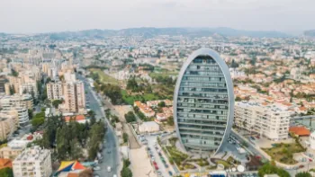 Modern business center with offices in shape of oval or egg in Limassol. cyprus economy