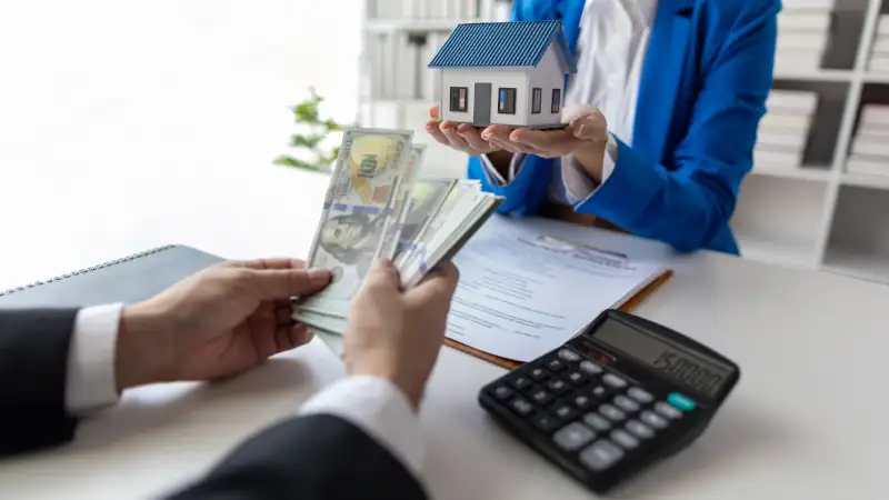 Businesswoman, real estate agents discuss offer house sale prices, fee, mortgage, interest, rent, cash flow, loan. House and land trading ideas.