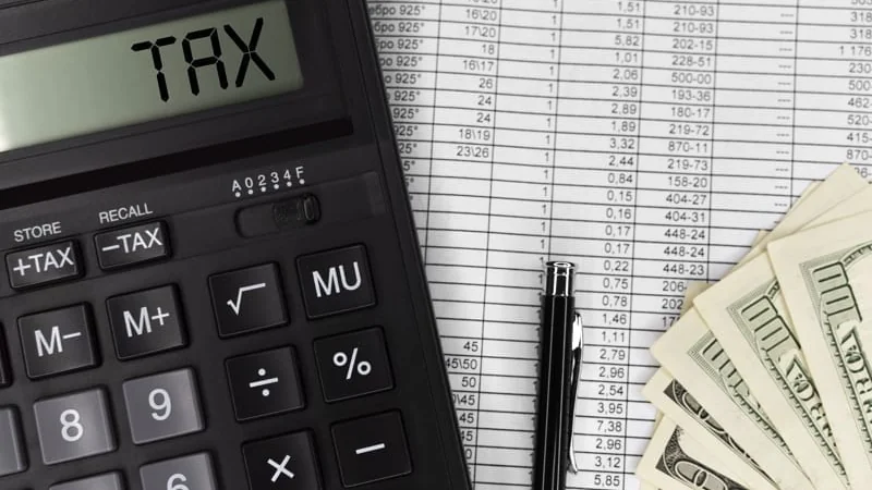 Calculator with text Tax. taxes in belize