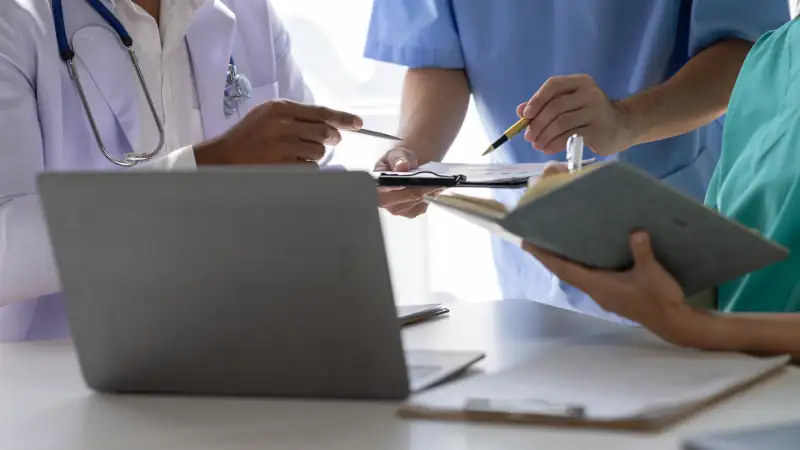 Medical, meeting and healthcare workers for team in office, discussion, brainstorming and planning.