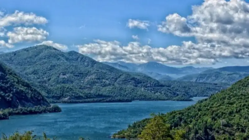 A view of the sky in Chile, showing puffy white clouds.