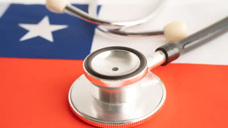 Chile flag with black stethoscope, Business and finance.