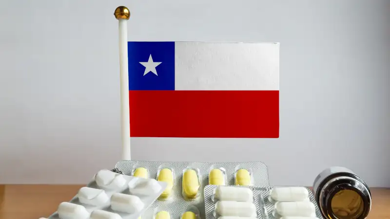 Flag of Chile with Pills and Capsules. Pharmaceutical Concept