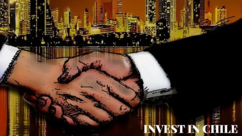 Two men shaking hands after completing an investment in Chile.