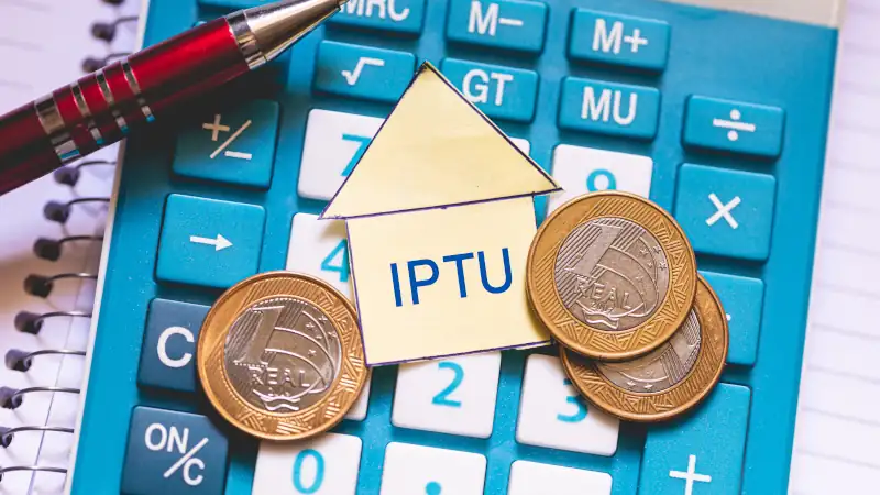 The initials IPTU refer to Urban Building and Land Tax. Brazilian economy and finance.