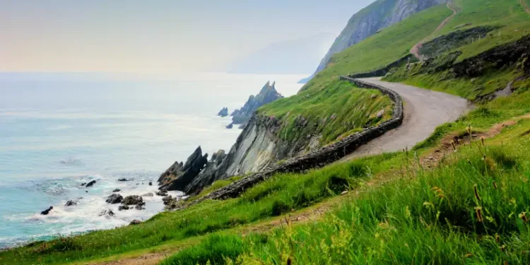 Road along the scenic coast of western Ireland. Slea Head, Dingle peninsula, County Kerry.