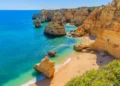 View of beautiful Marinha beach with crystal clear turquoise water near Carvoeiro town, Algarve region, Portugal