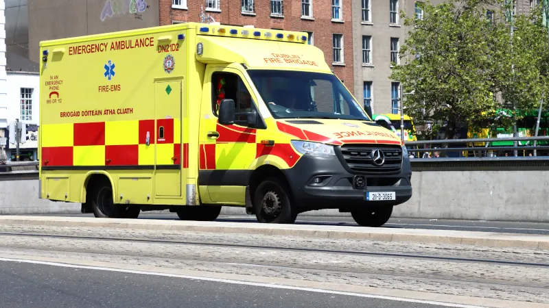 Ambulance crossing one of the bridges over the River Liffey, Dublin, Ireland