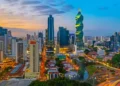 The colorful panoramic skyline of Panama City at sunset with high rise skyscrapers, Panama, Central America.