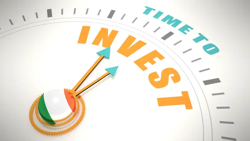 Time to invest words on clock face. Flag of Ireland