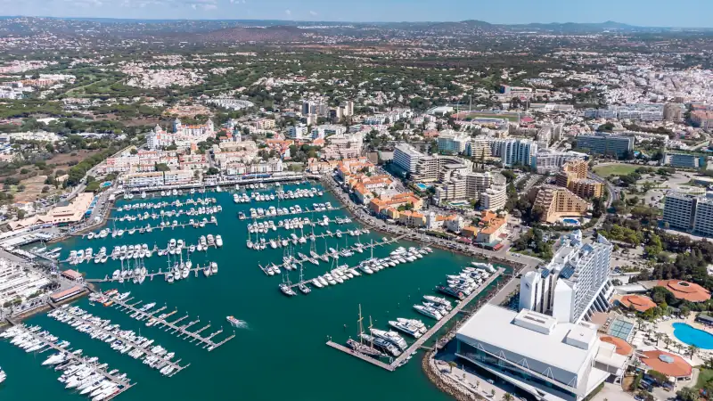Beautiful aerial perspective of Vilamoura marina. Luxury hotels, yachts docked in the port