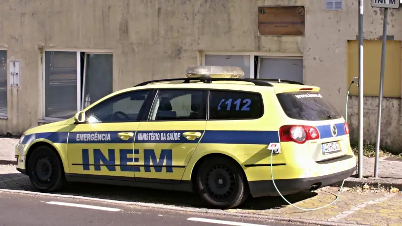 Emergency services vehicle visible in the town of Tavira.