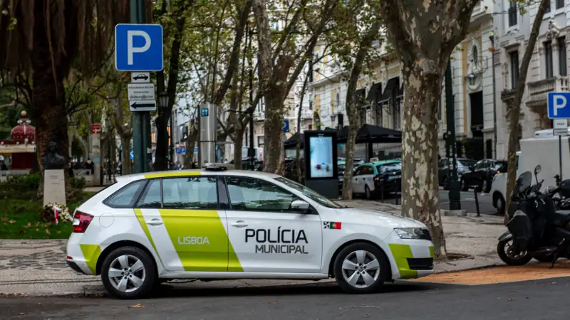 Municipal police car parked on a street in Tavira, Portugal.