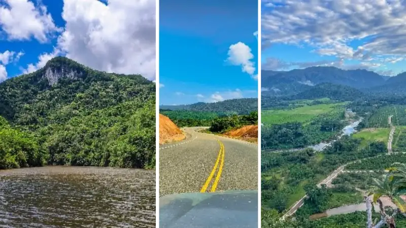 tropical region with a river, a winding rural road, and a wide valley with farmland and mountains in the distance