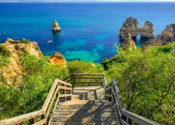 Wooden walkway to secret beach near Lagos on Ponta da Piedade. algarve region