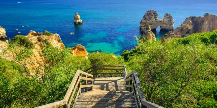 Wooden walkway to secret beach near Lagos on Ponta da Piedade. algarve region