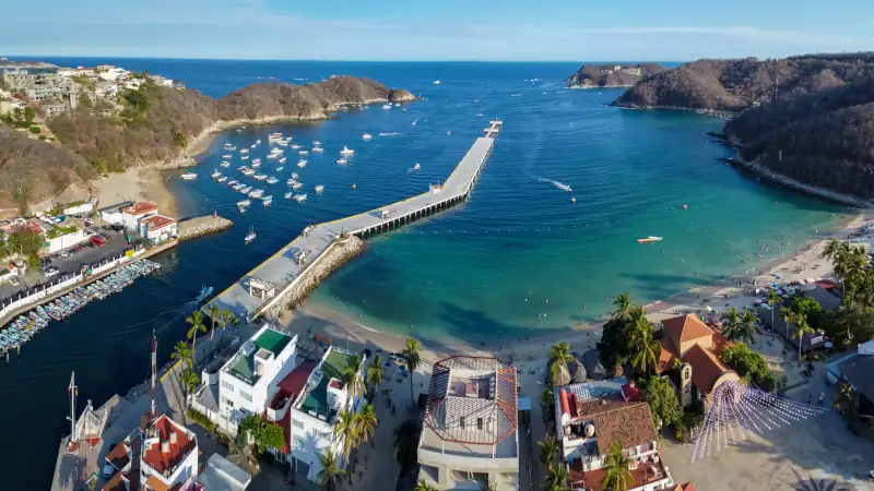 photo of huatulco oaxaca mexico panoramic summer scenic view vacation spot pacific coast america with the sea in the background
