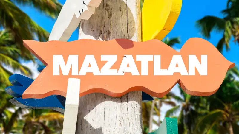 Mazatlan welcome sign with palm trees