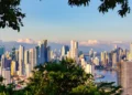 View of the skyline of Panama City framed by tropical rain forest