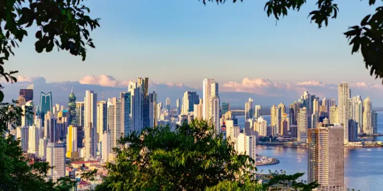 View of the skyline of Panama City framed by tropical rain forest