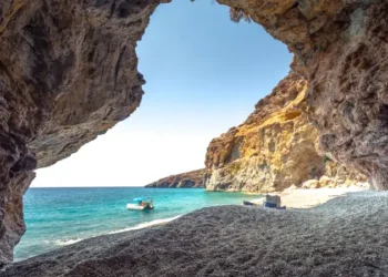 Amazing summer view from a cave at Iligas beach with magical turquoise waters, South Chania, Crete, Greece.