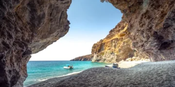 Amazing summer view from a cave at Iligas beach with magical turquoise waters, South Chania, Crete, Greece.